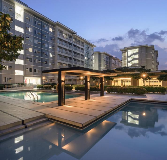 Agape Rentals In Trees Residences 加洛坎 外观 照片