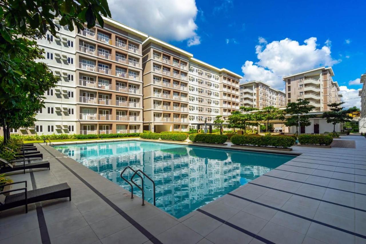 Agape Rentals In Trees Residences 加洛坎 外观 照片