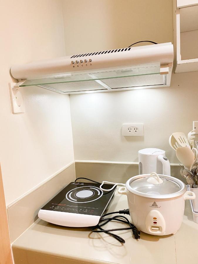 Agape Rentals In Trees Residences 加洛坎 外观 照片