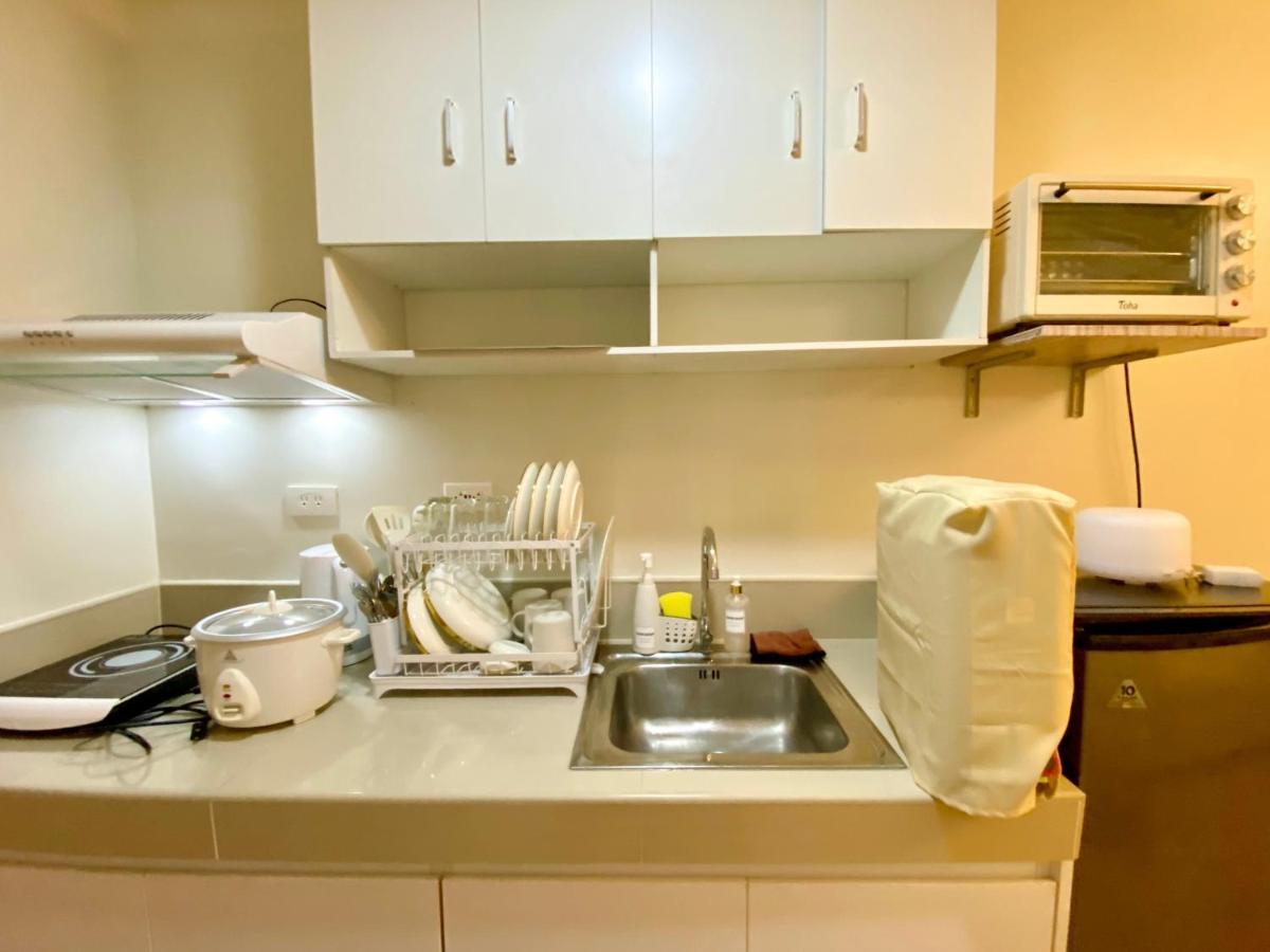 Agape Rentals In Trees Residences 加洛坎 外观 照片